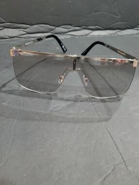 Frye silver flatbrow rimless frame oversized clear lenses square sunglasses